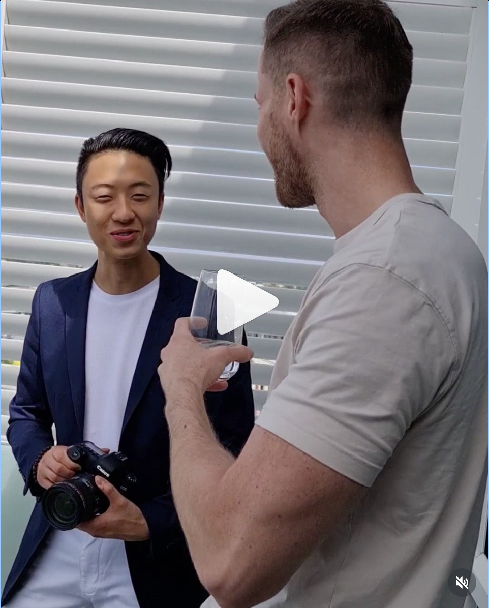 Jay at an Auckland meetup, in conversation with a seller